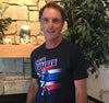 Unisex T-Shirt, Navy (60% cotton, 40% polyester) Modeled by Doug Flutie